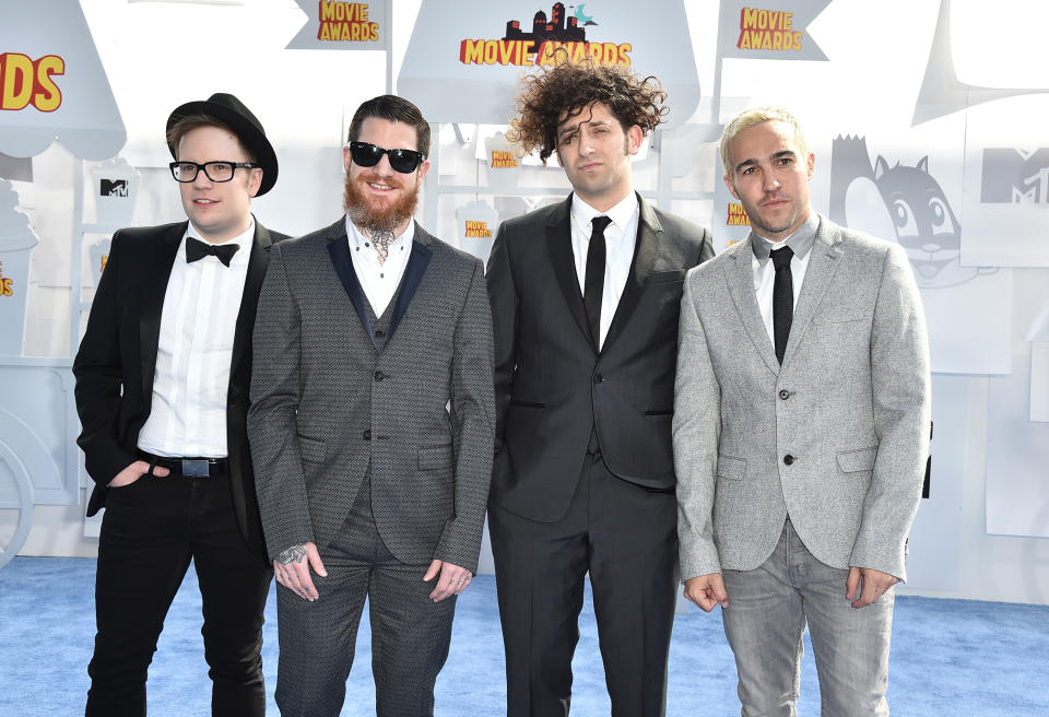 Patrick Stump, from left, Andy Hurley, Joe Trohman, and Pete Wentz of Fall Out Boy arrive at the MTV Movie Awards at the Nokia Theatre on Sunday, April 12, 2015, in Los Angeles. (Photo by Jordan Strauss/Invision/AP)