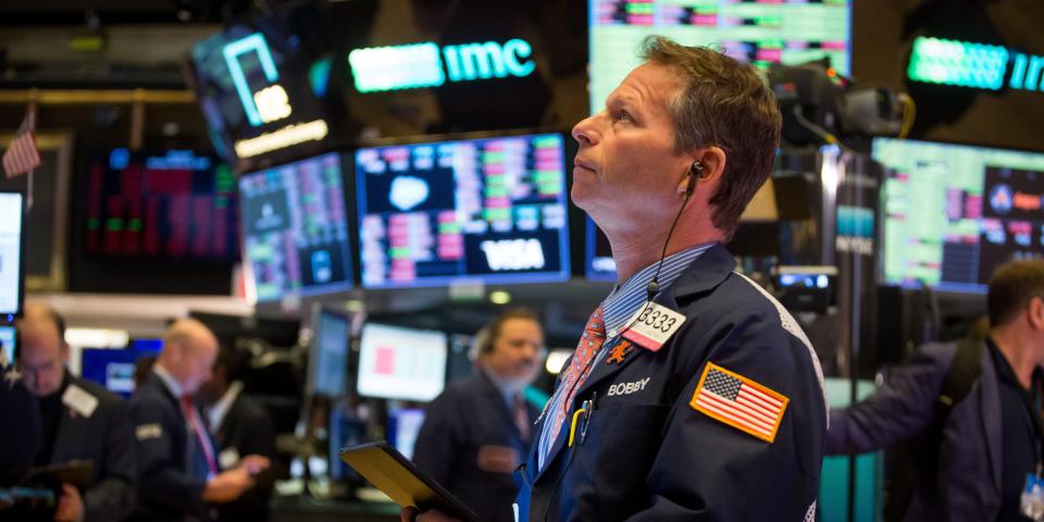 Traders work at the New York Stock Exchange in New York, the United States, March 16, 2020