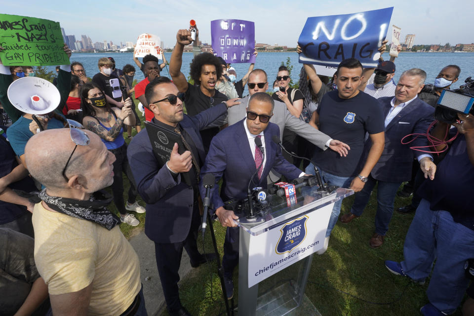 James Craig, a former Detroit Police Chief, announces he is a Republican candidate for Governor of Michigan amongst protesters on Belle Isle in Detroit, Tuesday, Sept. 14, 2021. (AP Photo/Paul Sancya)