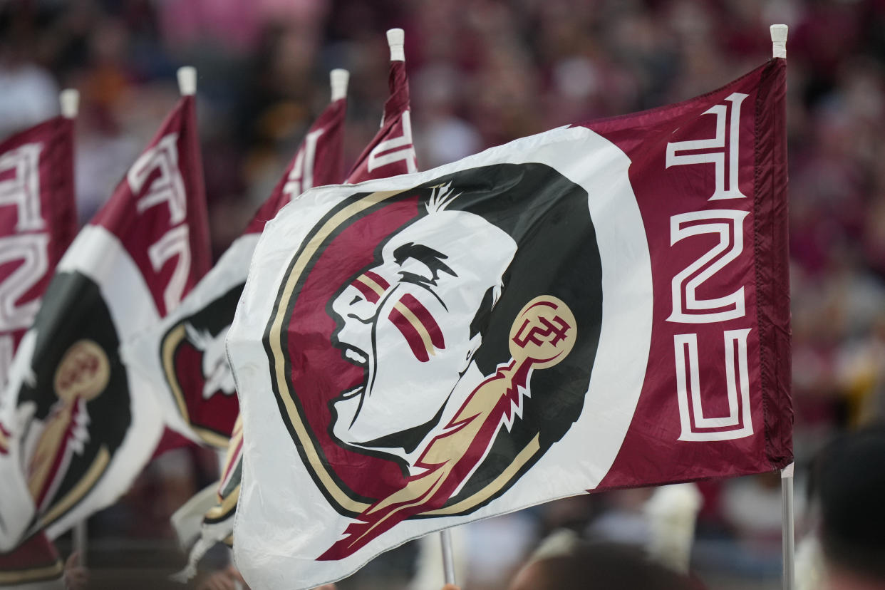 ORLANDO, FL - DECEMBER 29: a flag with he Florida State Seminoles logo is displayed during the Cheez-It Bowl between the Oklahoma Sooners and the Florida State Seminoles on Thursday, December 29, 2022 at Camping World Stadium, Orlando, Fla. (Photo by Peter Joneleit/Icon Sportswire via Getty Images)