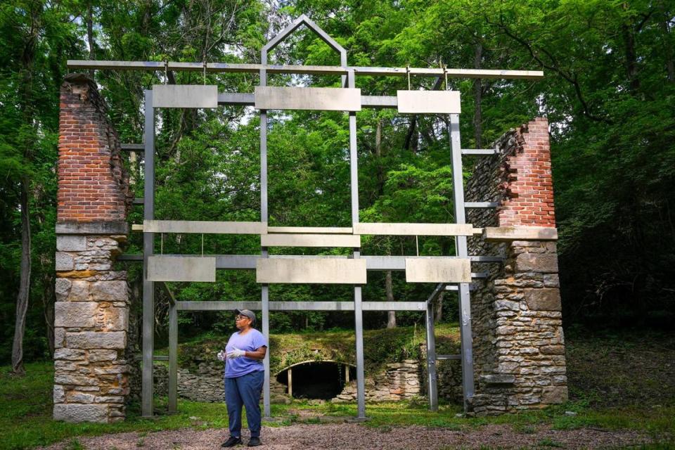 The Rev. Stacy Evans pauses near the ruins of an old brew house in the Quindaro Ruins on June 3. Evans, who chairs the Quindaro Ruins Project Foundation board, is spearheading an effort to revitalize the site.