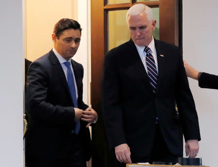 FILE PHOTO: U.S. Vice President Mike Pence (right) and Carlos Alfredo Vecchio, charge d’affaires appointed by Venezuela's self-proclaimed interim president Juan Guaido leave the White House after their meeting in Washington, U.S., January 29, 2019. REUTERS/Jim Young/File Photo