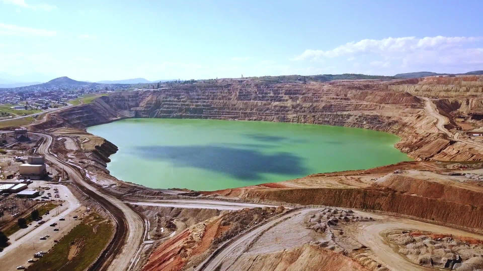 The Berkeley Pit, a former open-pit copper mine in Butte, Montana, became a mile-long lake laden with heavy metals - and a federal Superfund environmental clean-up site.  / Credit: CBS News