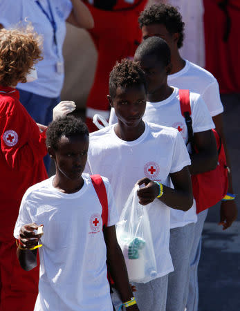 Migrants disembark at the Sicilian port of Catania, Italy, October 4, 2016. REUTERS/Antonio Parrinello