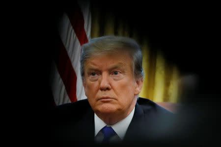 U.S. President Donald Trump looks on during a meeting with China's Vice Premier Liu He in the Oval Office at the White House in Washington, U.S., February 22, 2019. REUTERS/Carlos Barria