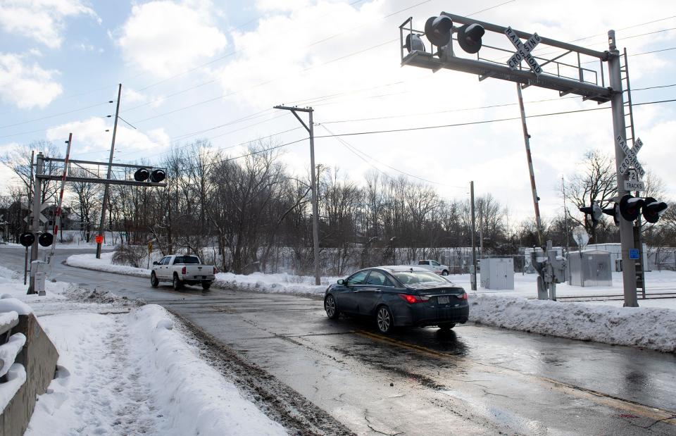 The railroad tracks where Stow street becomes Summit street, just east of the Tannery Park parking and bridge in Kent, had a lot more snow on them when Kent Firefighter Pat Paisley stopped on his way home from work and got a woman out of her stuck car before a train struck it the morning of Jan. 17.