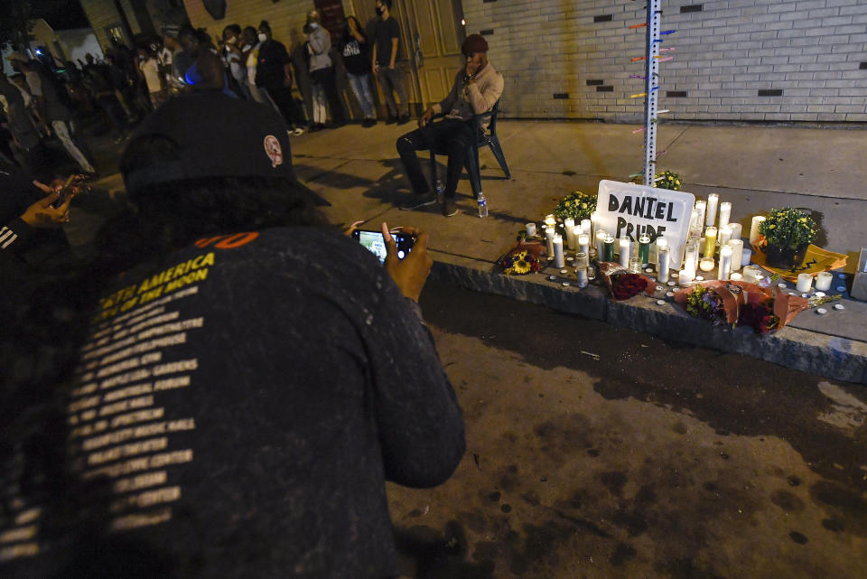 FILE - In this Sept. 2, 2020, file photo, a makeshift memorial is set up in Rochester, N.Y., near the site where Daniel Prude was restrained by police officers. In a decision announced Tuesday, Feb. 23, 2021, a grand jury voted not to charge officers shown on body camera video holding Daniel Prude down naked and handcuffed on a city street last winter until he stopped breathing. His brother Joe Prude said Wednesday, Feb. 24 he had viewed police body camera footage showing what happened after officers caught up with Daniel Prude, naked on a frigid March night, as irrefutable proof of a crime. (AP Photo/Adrian Kraus, File)