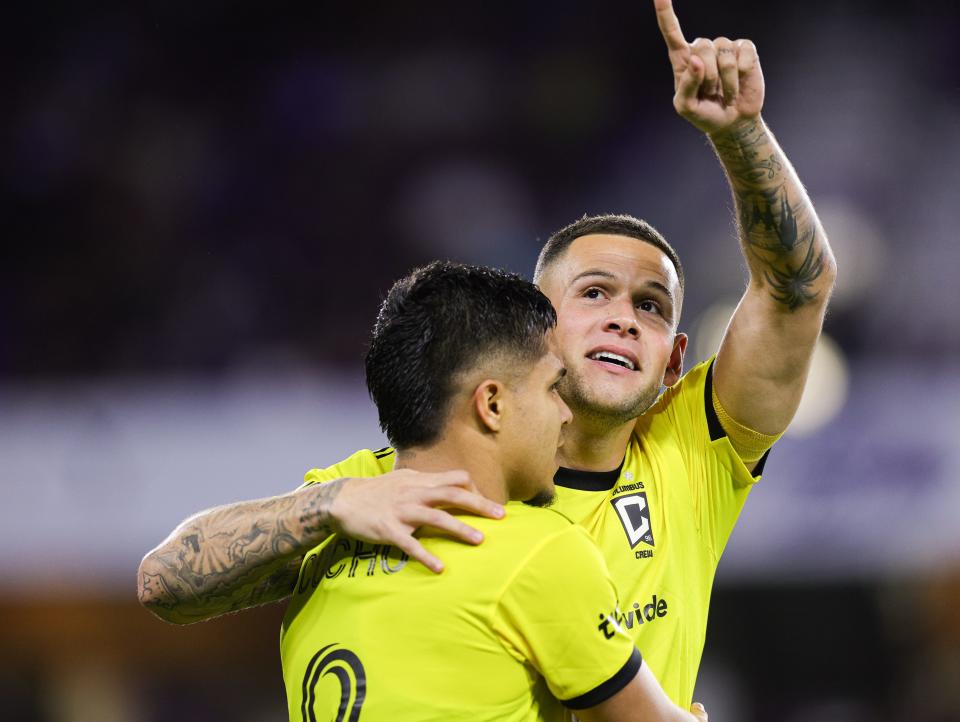 Nov 25, 2023; Orlando, Florida, USA; Columbus Crew forward Christian Ramirez (17) celebrates scoring a goal against Orlando City with forward Cucho Hernández (9) during the first half of extra time in a MLS Cup Eastern Conference Semifinal match at Exploria Stadium. Mandatory Credit: Nathan Ray Seebeck-USA TODAY Sports