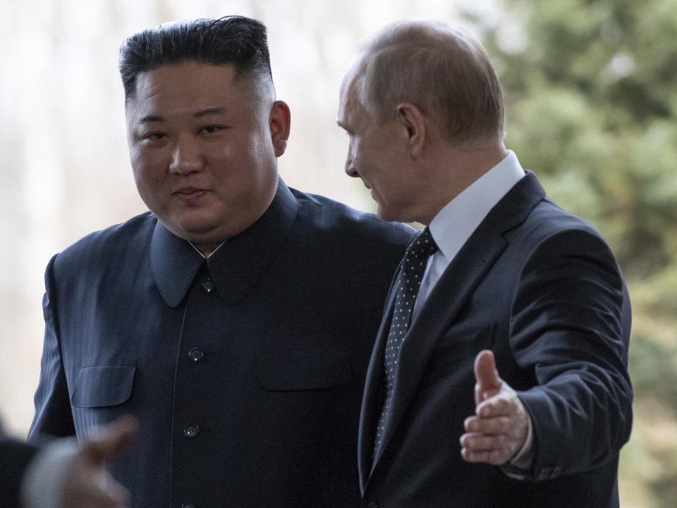 Russian President Vladimir Putin, right, welcomes North Korea's leader Kim Jong Un for their talks in Vladivostok, Russia, Thursday, April 25, 2019. Putin and Kim are set to have one-on-one meeting at the Far Eastern State University on the Russky Island across a bridge from Vladivostok. The meeting will be followed by broader talks involving officials from both sides. (AP Photo/Alexander Zemlianichenko, Pool)