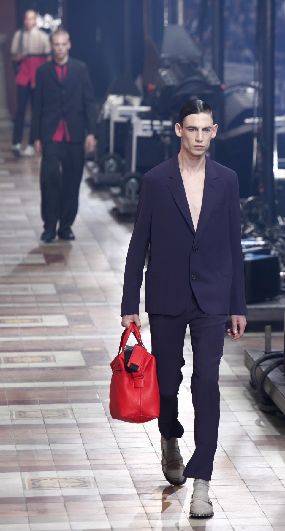 A model wears a creations for Lanvin's Spring-Summer 2014 men's collection presented Sunday, June 30, 2013 in Paris. (AP Photo/Thibault Camus)