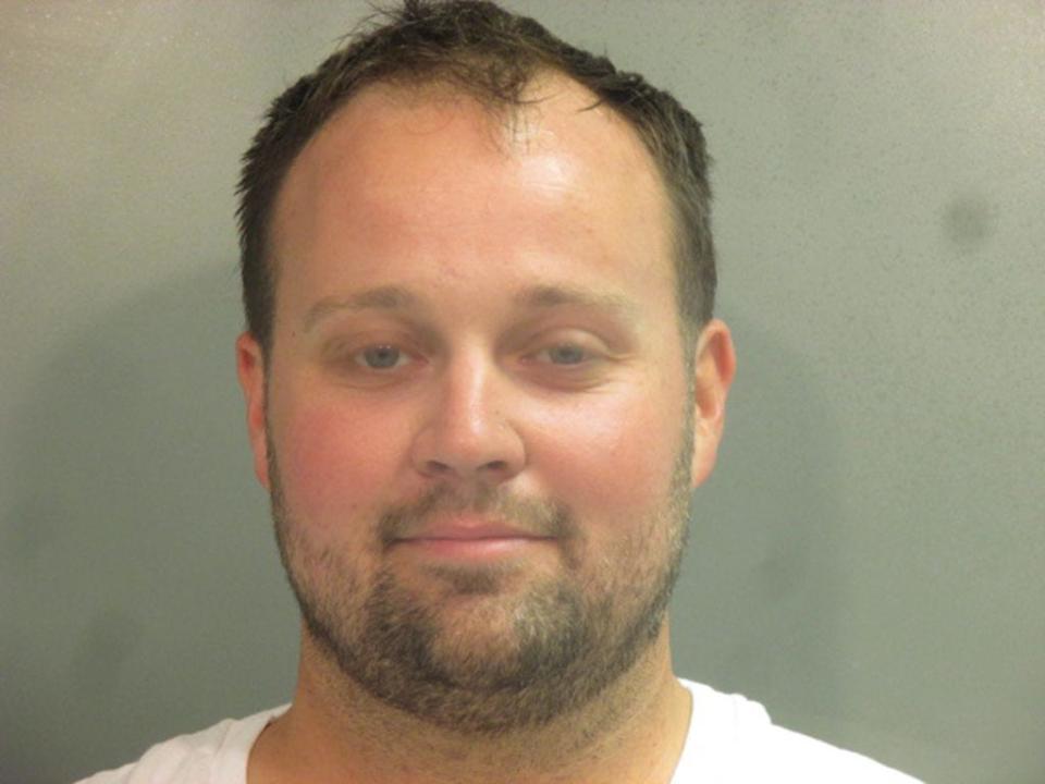 In this handout photo provided by the Washington County Sheriff's Office, former television personality on "19 Kids And Counting" Josh Duggar poses for a booking photo after his arrest on April 29, 2021, in Fayetteville, Arkansas.