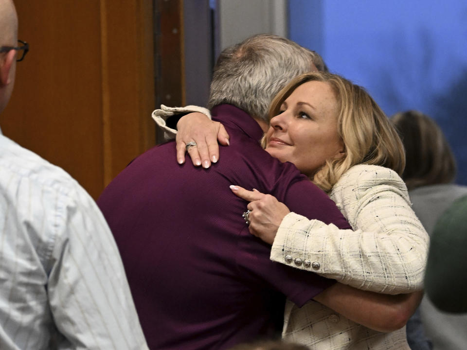 Oakland County prosecutor Karen McDonald hugs Steve St. Juliana, father of Oxford High School shooting victim Hana St. Juliana, following the guilty verdict of James Crumbley, in Oakland County Court in Pontiac, Mich., Thursday, March 14, 2024. Crumbley, the father of the Michigan school shooter, was found guilty of involuntary manslaughter, a second conviction against the teen’s parents who were accused of failing to secure a gun at home and doing nothing to address acute signs of his mental turmoil. (Robin Buckson/Detroit News via AP, Pool)