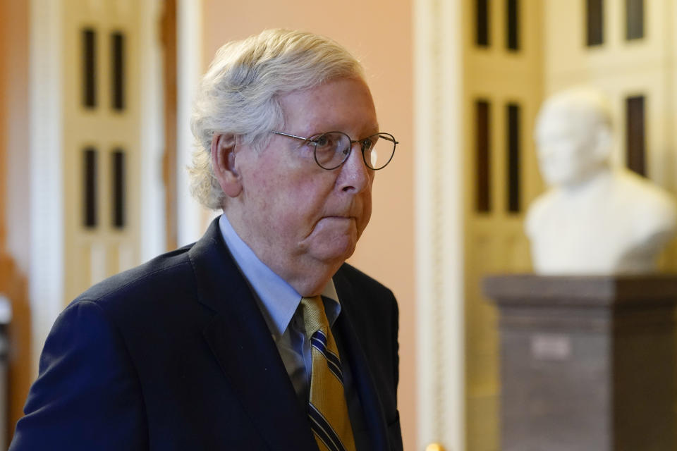 FILE - Senate Minority Leader Mitch McConnell of Ky. walks to his office on Capitol Hill in Washington, Saturday, Aug. 6, 2022. Democrats pushed their election-year economic package to Senate passage Sunday, Aug. 7, 2022, a compromise less ambitious than Biden’s original domestic vision but one that still meets party goals of slowing global warming, moderating pharmaceutical costs and taxing immense corporations. (AP Photo/Patrick Semansky, File)