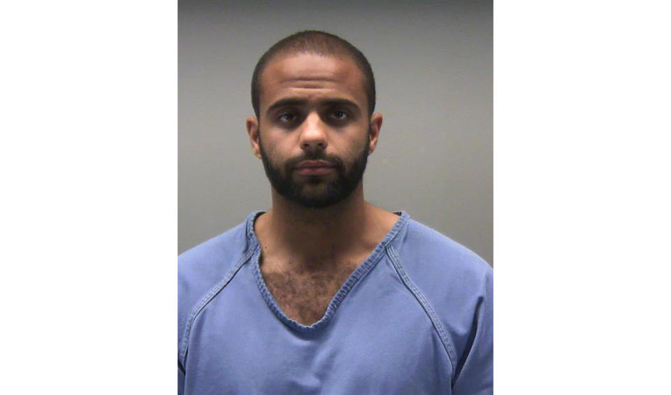 FILE- This undated booking photo provided by the Montgomery County Sheriff shows Ethan Kollie. A federal magistrate judge on Friday, Aug. 23, 2019, rejected a request from Kollie’s attorneys to revoke his detention order. Federal agents say Kollie, a longtime friend of Dayton, Ohio, gunman, Connor Betts, bought the body armor, a 100-round magazine and a gun accessory used in a mass shooting on Aug. 4., but there’s no indication that the man knew that his friend was planning a massacre. (Montgomery County Sheriff via AP)