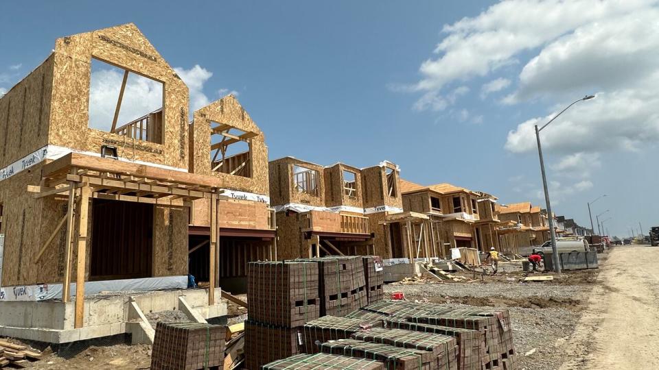 A street of detached homes under construction in Barrie, Ont. 