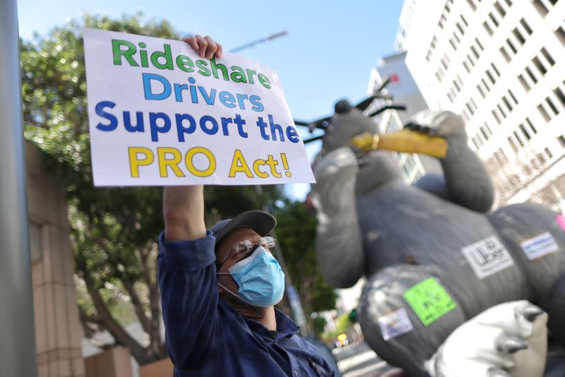 FILE PHOTO: Rideshare Uber and Lyft drivers rally in support of the PRO Act, in Los Angeles