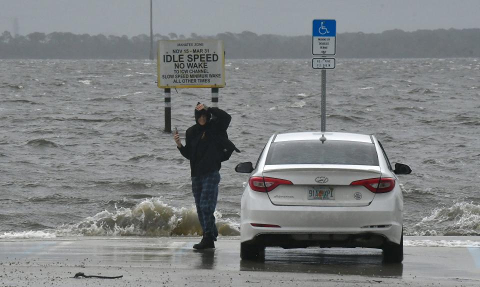 Port St. John Boat Ramp in Brevard County being hit by rain and wind bands from Hurricane Ian on Wednesday, as the Indian River reached high levels at the Port St. John Boat Ramp