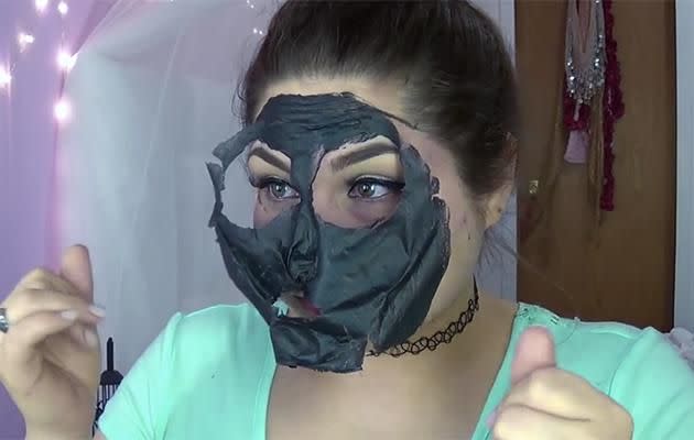 The mask comes off in one whole piece. Photo: YouTube.