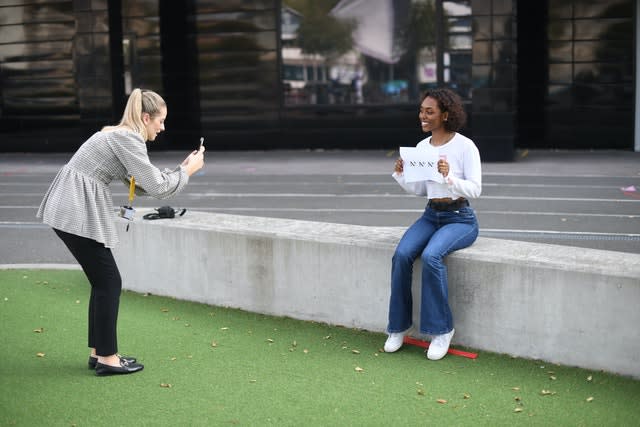 Lauren Lopez, who achieved three A* and is going to Cambridge University, poses for a photograph as students at Ark Globe Academy in Brixton, London, receive their A-level results 