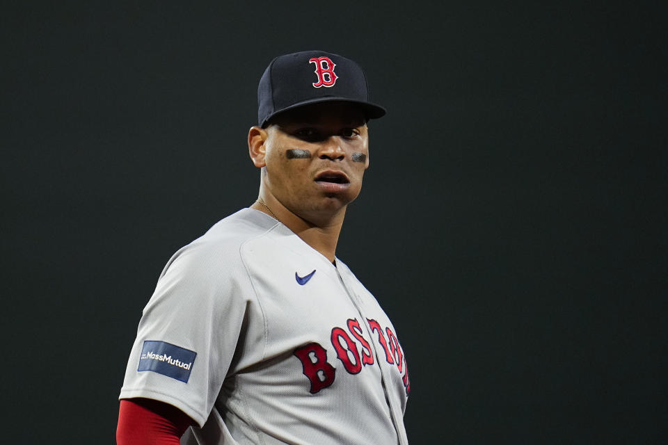 FILE - Boston Red Sox third baseman Rafael Devers looks on during the eighth inning of a baseball game against the Baltimore Orioles, Sept. 29, 2023, in Baltimore. With the Red Sox ramping up at the start of spring training, Devers made it clear Tuesday, Feb. 20, 2024, that he felt the franchise should have done more to improve the roster over the winter. (AP Photo/Julio Cortez, File)