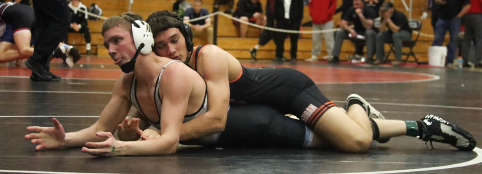 York Suburban's Nick Wilt takes down Waynesboro's Logan Lowans at 152 pounds in a first-round matchup at South Western High School during the District 3 Class AAA Section IV wrestling championships on Saturday, Feb. 17, 2024.