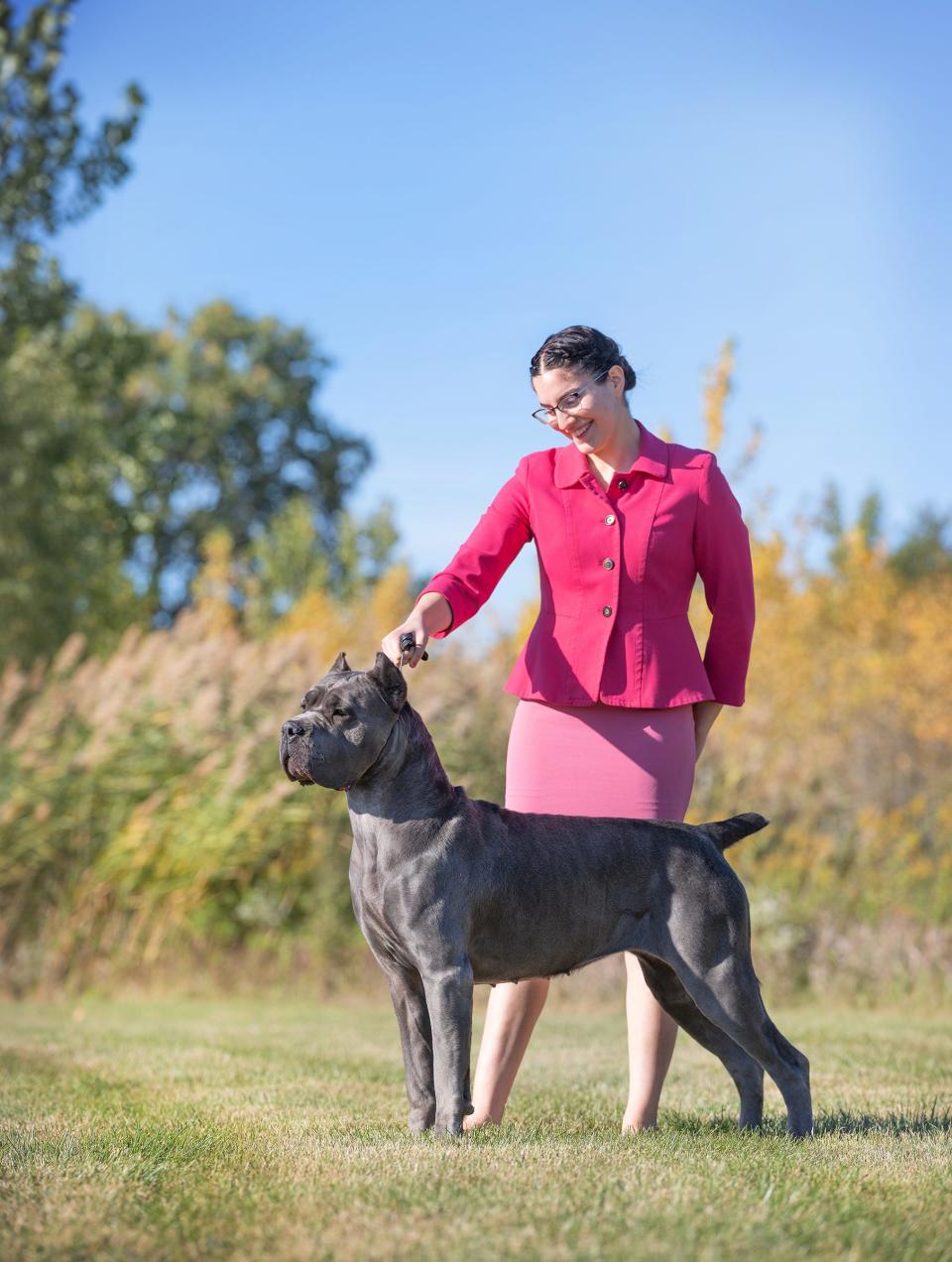 Lihi Ruvio, 17, stands with her Cane Corso dog named Sage. Sage will compete in Westminster for the first time in May.