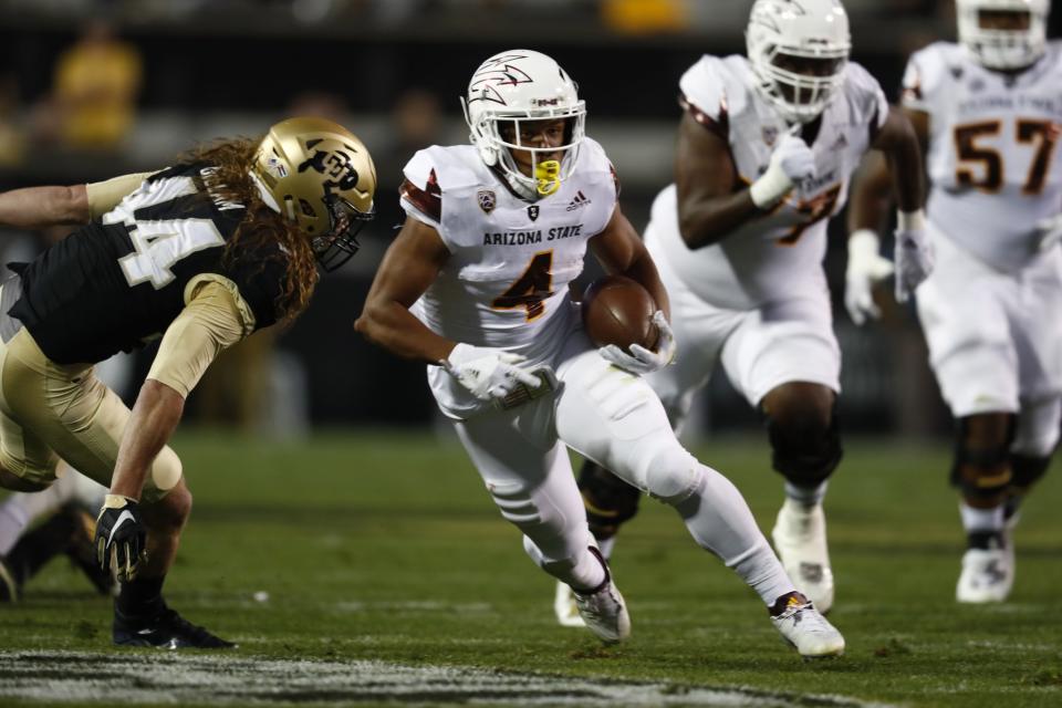 Colorado linebacker Addison Gillam (L) has 270 tackles in his career. (AP)