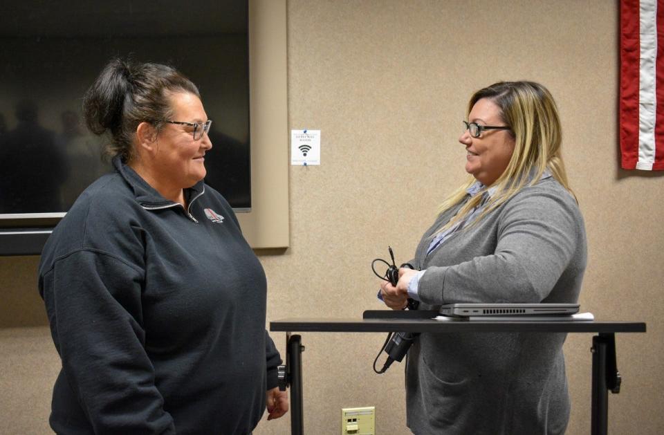 Kirsten Trammel of Silver Top Sports Bar & Grill, left, talks with Ohio SBDC Director Miranda Hoffman after the workshop on Feb. 6 about resources for improving her business.