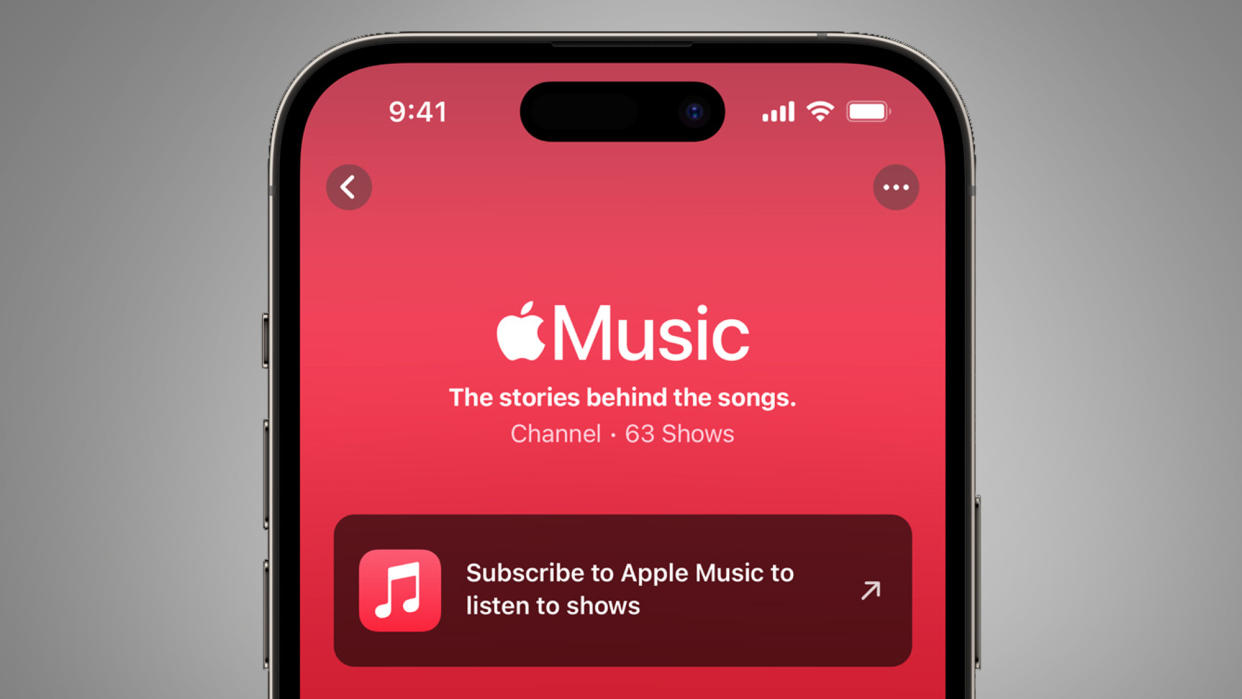  A phone on a grey background showing the Apple Music app 