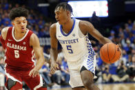 Kentucky's Immanuel Quickley, right, drives on Alabama's Jaden Shackelford during the second half of an NCAA college basketball game in Lexington, Ky., Saturday, Jan 11, 2020. Kentucky on 76-67. (AP Photo/James Crisp)