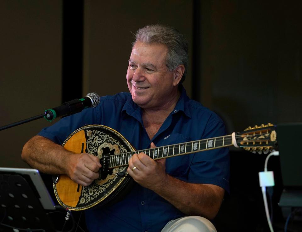 Nick Trivelas performs on the Bouzouki at the St Demetrios Greek Festival in Daytona Beach, Friday, Nov. 11, 2022.