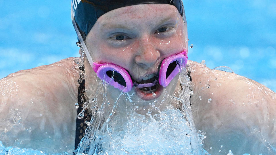 Pictured here, American Lydia Jacoby had to swim her breaststroke leg with her goggles in her mouth.