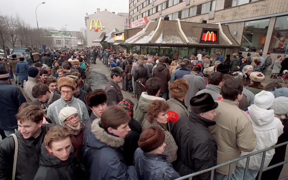 Hundreds of Russians queued to eat at McDonald's when it first opened at the end of the Cold War - AP Photo/Alexander Zemlianichenko