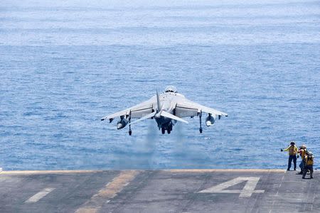 An AV-8B Harrier II launches from the amphibious assault ship USS Boxer to conduct missions in support of Operation Inherent Resolve (U.S. military's operational name for the intervention against the Islamic State of Iraq and the Levant, ISIL), in the Arabian Gulf, June 16, 2016. Mass Communication Specialist 3rd Class Brett Anderson/U.S. Navy/Handout via Reuters