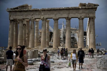 People visit the Acropolis hill with the ancient Parthenon temple seen in the background in Athens, Greece June 5, 2015. REUTERS/Alkis Konstantinidis