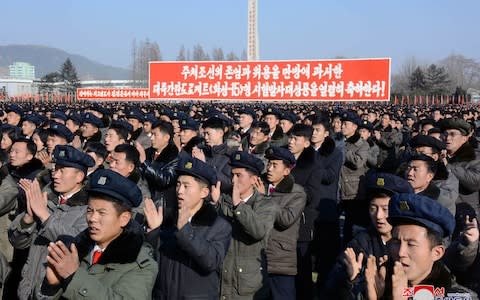 A rally to celebrate the successful ICBM test-fire in South Hamgyong, North Korea - Credit:  AFP