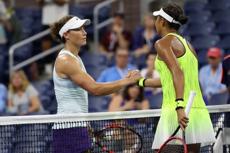 Sep 1, 2016; New York, NY, USA; Shuai Zhang of China (R) shakes hands with Samantha Stosur of Australia (L) after their match on day four of the 2016 U.S. Open tennis tournament at USTA Billie Jean King National Tennis Center. Geoff Burke-USA TODAY Sports