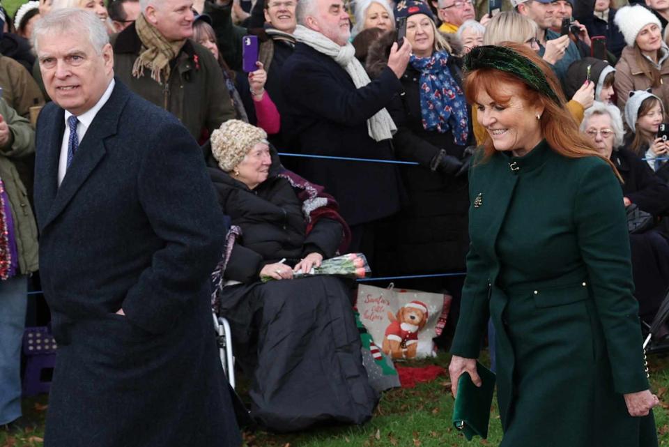 <p>ADRIAN DENNIS/AFP via Getty </p> Prince Andrew and Sarah Ferguson attend Christmas 2023