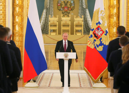 Russian President Vladimir Putin arrives for a personal send-off for members of the Russian Olympic team at the Kremlin in Moscow, Russia, July 27, 2016. REUTERS/Maxim Shemetov