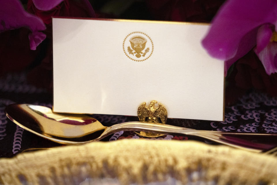 A detail of a place setting is seen during a preview of the State Dinner with Kenya's President William Ruto, Wednesday, May 22, 2024, at the White House in Washington. (AP Photo/Jacquelyn Martin)