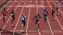 Karsten Warholm, of Norway, third left, celebrates as he wins the gold medal ahead of Rai Benjamin, of United States in the final of the men's 400-meter hurdles at the 2020 Summer Olympics, Tuesday, Aug. 3, 2021, in Tokyo, Japan. (AP Photo/Charlie Riedel)