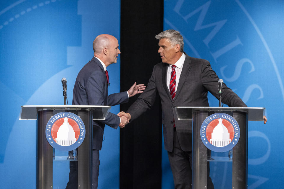 Incumbent Gov. Spencer Cox, left, shakes hands with Utah Rep. Phil Lyman after Utah's gubernatorial GOP primary debate on Tuesday, June 11, 2024, in Salt Lake City. (Isaac Hale/The Deseret News via AP, Pool)