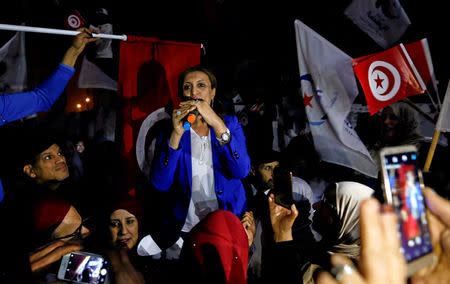 Souad Abderrahim, a candidate of the Islamist Ennahda party, addresses supporters outside the party's headquarters after Ennahda claimed victory in a local poll in Tunis, Tunisia, May 6, 2018. REUTERS/Zoubeir Souissi