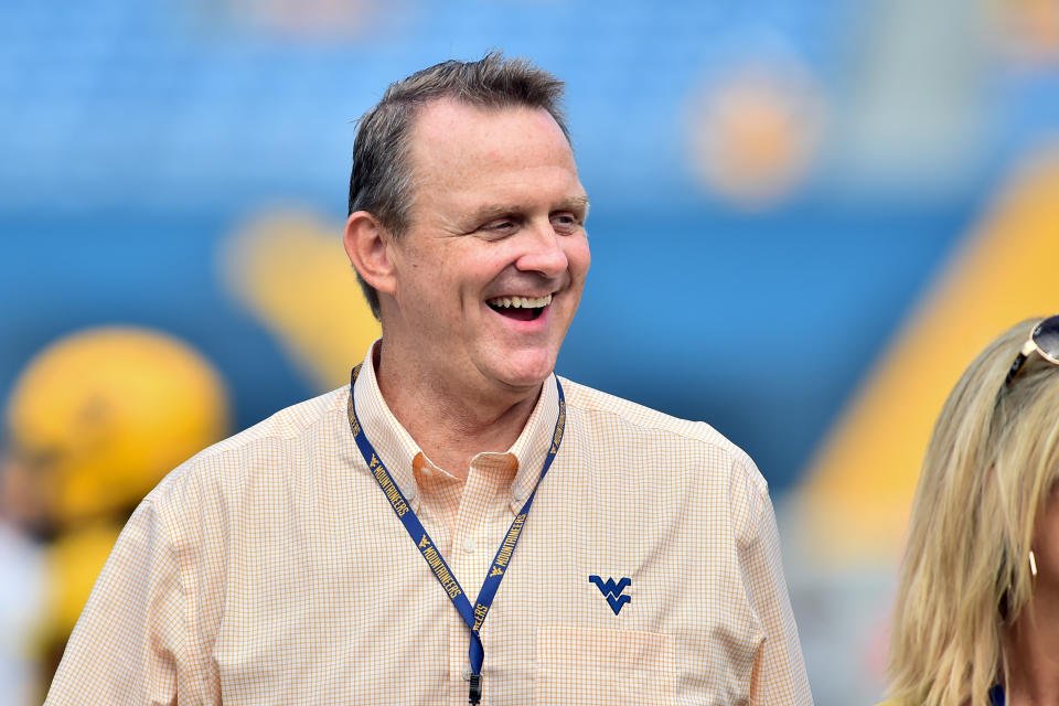 FILE - West Virginia athletic director Shane Lyons watches before an NCAA college football game against Virginia Tech in Morgantown, W.Va., Sept. 18, 2021. West Virginia President Gordon Gee announced the firing of Lyons on Monday, Nov. 14, 2022. (AP Photo/William Wotring, file)