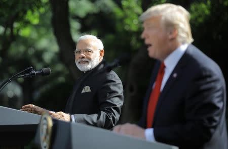 U.S. President Donald Trump (R) holds a joint news conference with Indian Prime Minister Narendra Modi in the Rose Garden of the White House in Washington, U.S., June 26, 2017. REUTERS/Carlos Barria