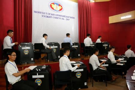 Election officials count votes in the presidential election in Ulaanbaatar, Mongolia, June 26, 2017. REUTERS/B. Rentsendorj