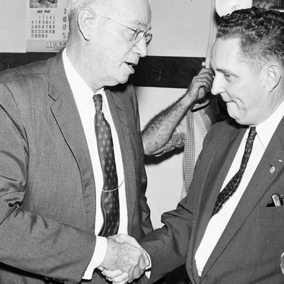Tarrant County Judge Gus Brown, left, resigned Aug. 14, 1958. Successor Marvin Simpson, right, wanted to get rid of the expensive electric courthouse flag.