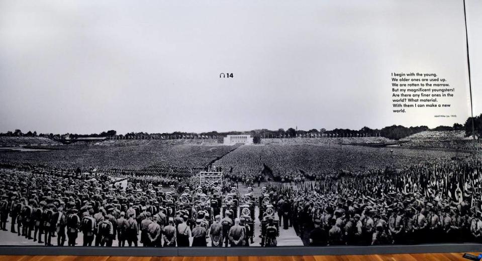 The exhibition includes a giant photograph taken at a Nazi rally in Nuremberg, Germany, during World War II.