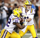 LSU Tigers running back Clyde Edwards-Helaire #22 takes the hand off from LSU Tigers quarterback Joe Burrow #9 Saturday Sept. 7, 2019 at Darrell K Royal-Texas Memorial Stadium in Austin, Tx. ( Photo by Edward A. Ornelas )