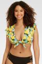 <p><strong>SHOP NOW: </strong>$40, <a href="https://www.target.com/p/beach-betty-153-by-miracle-brands-women-s-slimming-control-ruffle-tie-front-bikini-top-blue/-/A-53061598" rel="nofollow noopener" target="_blank" data-ylk="slk:target.com;elm:context_link;itc:0;sec:content-canvas" class="link ">target.com</a><br></p><p>Playful patterns are an easy way to stick with <a href="https://www.redbookmag.com/fashion/trends/g20086082/swimsuits-through-the-years/" rel="nofollow noopener" target="_blank" data-ylk="slk:your go-to style;elm:context_link;itc:0;sec:content-canvas" class="link ">your go-to style</a> (like a crop top that'll stay put in the water and protect your shoulders from the sun) while embracing a trend.</p>